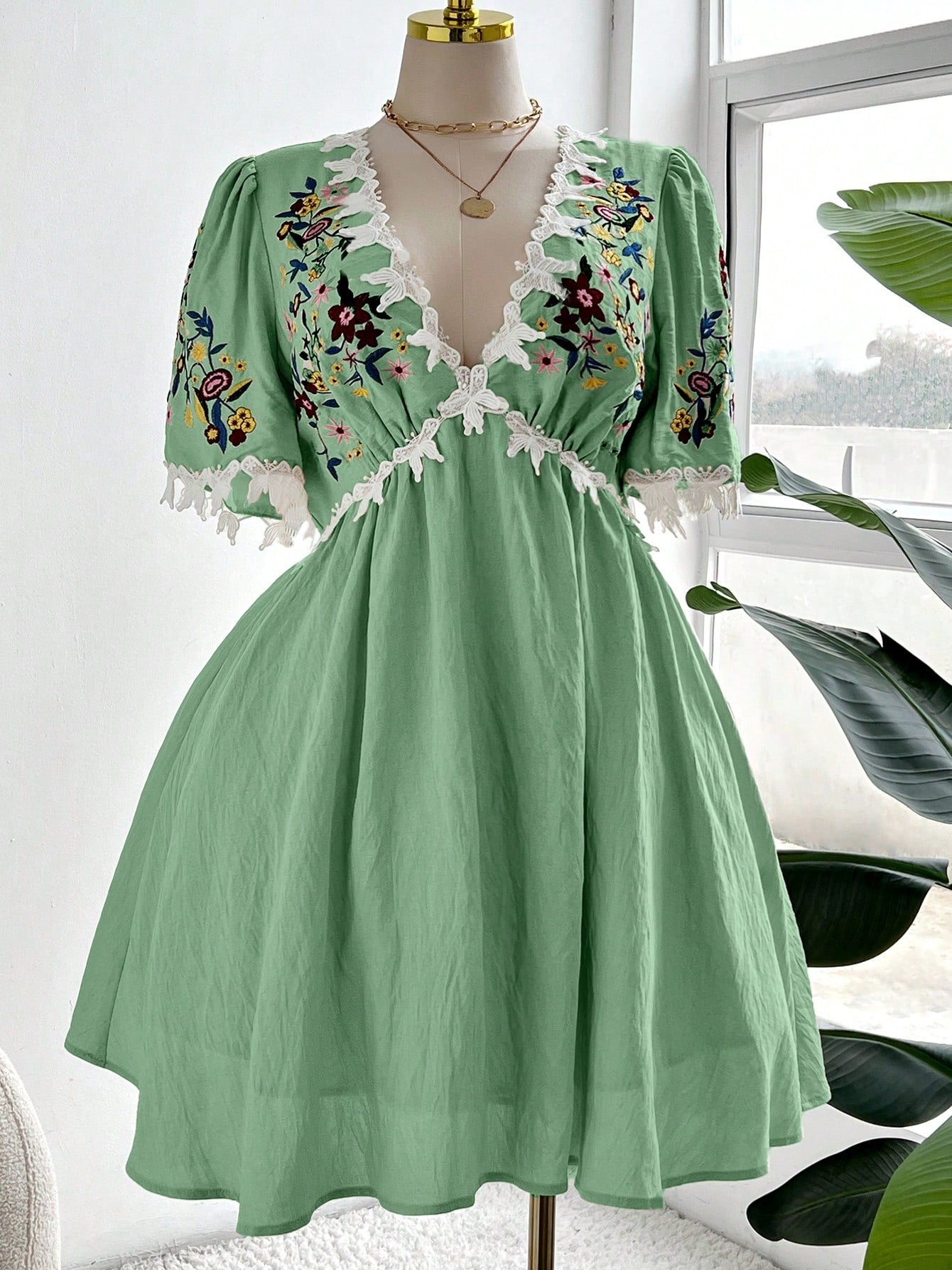 Step out in style with this elegant plus size woven dress featuring a flattering V-neck and delicate embroidery. The playful ruffle hem adds a fun twist, making it perfect for casual chic occasions. Comfortable and charming, it’s your go-to for effortless confidence and flair.