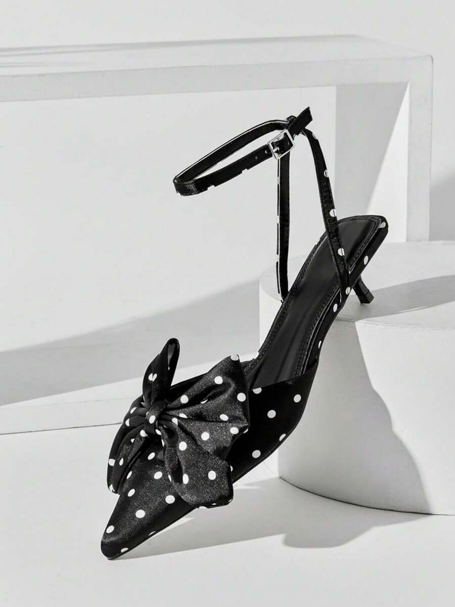 Elevate your everyday wardrobe with these sophisticated pointed-toe kitten heel pumps, designed for the modern woman who values both comfort and style. The delicate ankle strap provides secure support while the refined kitten heel offers an ideal balance of elegance and wearability. Perfect for transitioning from office to evening occasions, these pumps feature a sleek silhouette that complements dresses, skirts, and tailored trousers. The pointed toe elongates the leg, while the manageable heel height make