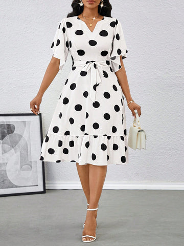 Unleash your inner fashionista with this elegant polka dot midi dress! This dress features playful ruffle sleeves and a self-tie belt for a flattering and stylish look. Perfect for summer, this dress will have you looking and feeling stylish and confident. Go ahead, add it to your wardrobe! (Fashion-forward, stylish, flattering)