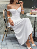 **Exude Timeless Charm with Our Elegant Polka Dot Strapless Dress!**

Embrace a classic yet sophisticated look with this stunning strapless piece, designed for those who appreciate vintage-inspired fashion with a modern twist. Whether you're attending a high-end party or enjoying a quiet dinner by the sea, this dress is your go-to for effortless glamour.

* **Iconic Polka Dot Pattern:** The playful yet refined polka dot print adds a touch of retro elegance, making it a standout choice that never goes out of