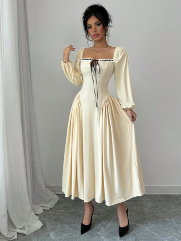 This dress is fit for a royal with its elegant princess-seam design, accentuated by ribbon details and long sleeves. Perfect for any formal event, this maxi dress will have you feeling like a true princess (without any of the responsibilities)!