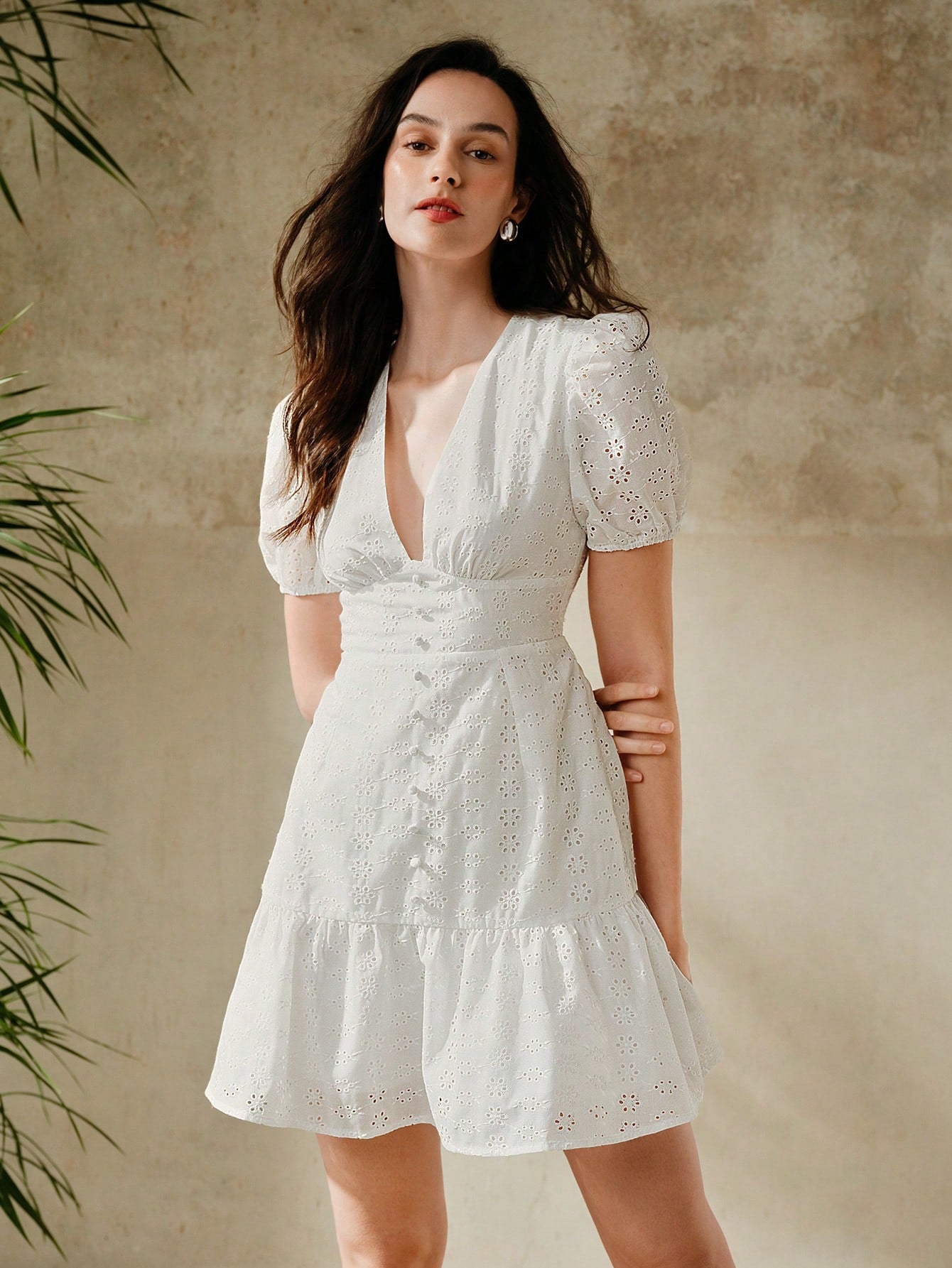 Unleash your inner elegance with our Puff Sleeve Jacquard Embroidered Dress. With a deep V-neck and delicate embroidery, this dress is perfect for any occasion. Be the envy of the room in this stunning and sophisticated design.