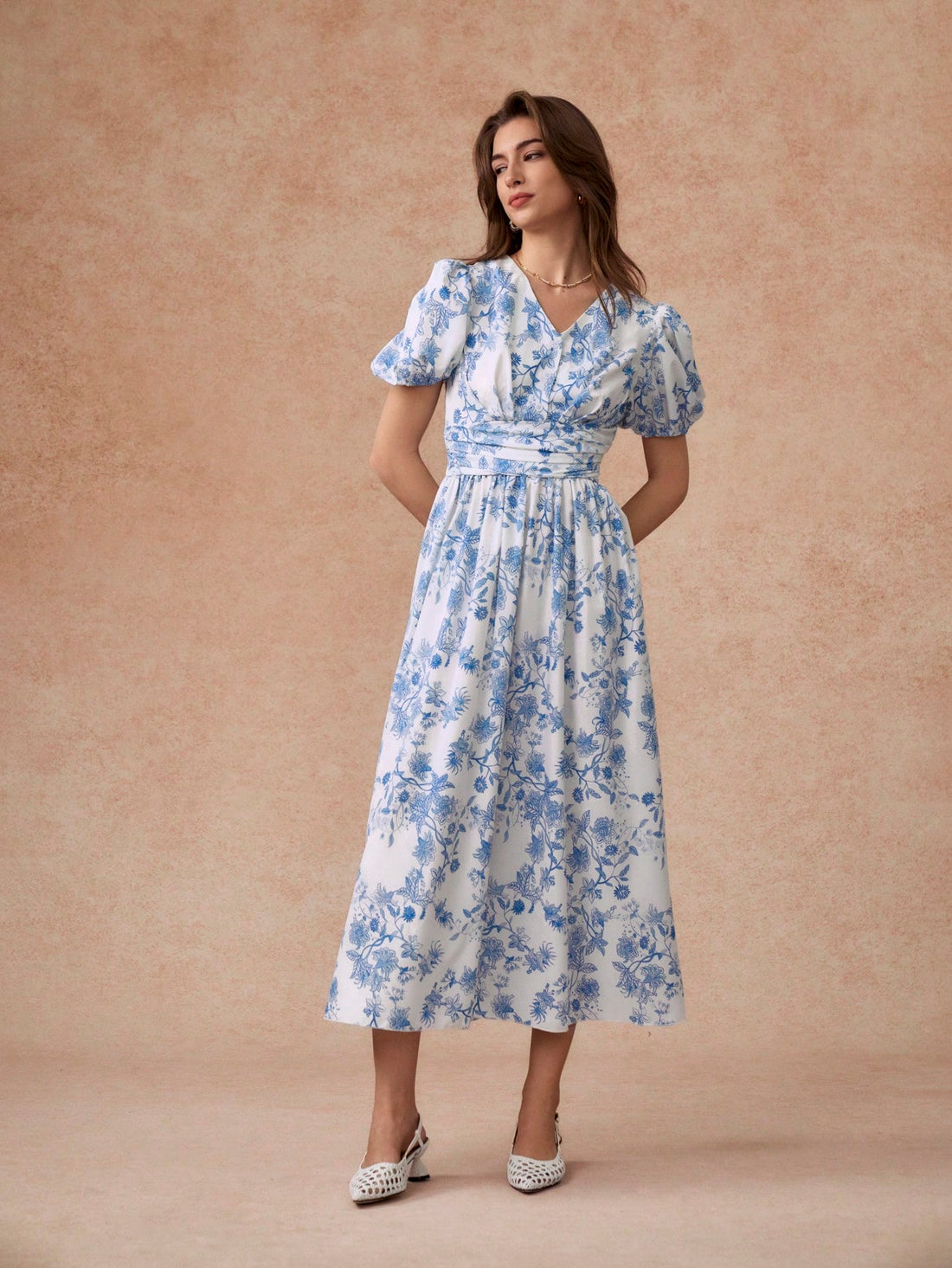 Be the epitome of spring and summer style with our Elegant Puff Sleeve V-Neck Waisted Dress. The perfect balance of sophistication and comfort, this dress features a flattering v-neck and puff sleeves, making it a must-have for any fashion-forward wardrobe. Embrace the season in style!