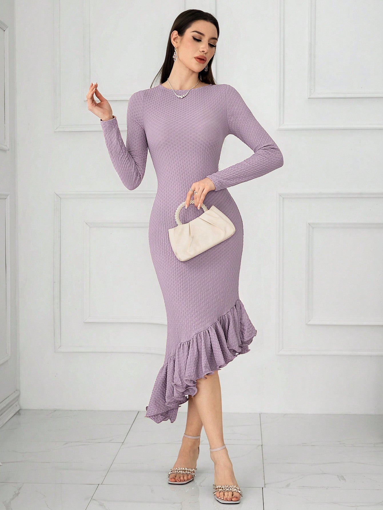 Add a touch of playfulness to your wardrobe with our Elegant Purple Asymmetric Dress. The three-dimensional fabric and slim fit provide a unique and flattering look, perfect for spring and turning heads on Valentine's Day. Don't miss out on this one-of-a-kind dress!