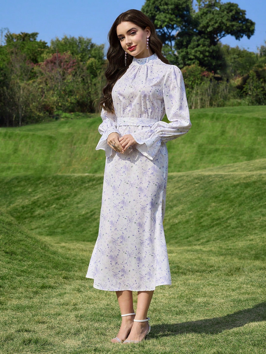 Get ready to make a statement in our Elegant Purple Chiffon Fishtail Dress. With its stunning floral print and waist shaping design, this dress will flatter your figure and give you a slimming look. Perfect for any occasion and sure to turn heads!