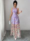This Elegant Purple Embroidered Mesh Dress features a delicate botanical overlay and a flowing silhouette to ensure every movement feels graceful and light.