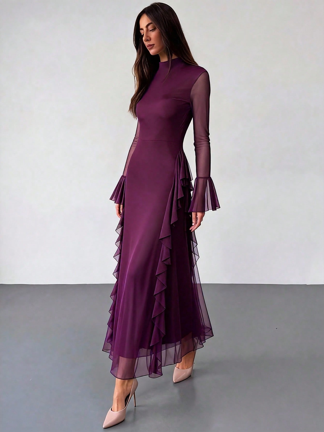 Slip into sophistication with this stunning purple dress that's ready for anything your calendar throws at it. The graceful ruffle hem adds a flirty touch while long sleeves keep you cozy through chilly seasons. Whether you're heading to a romantic dinner, celebrating with friends, or impressing at the office, this versatile piece transitions seamlessly from day to night. The rich purple hue flatters every complexion, making you feel confident and fabulous. Dress it up with heels and jewelry or keep it casu