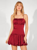 Turn heads this Valentine’s Day with this playful red satin suspender dress. Its backless design adds a flirty touch, while the delicate bow detail brings charm and elegance. Perfect for a romantic evening or a fun night out, this dress combines comfort and style effortlessly. Embrace the season of love with confidence and grace in this stunning piece.
