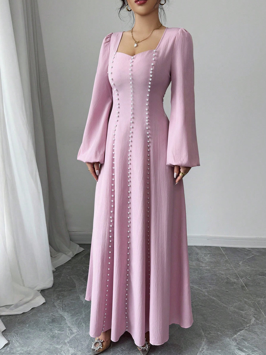 Twirl into the season with this eye-catching red dress that's ready to make memories! The beaded texture adds a playful pop to your wardrobe, while the classic crew neck keeps things comfortably chic. This woven wonder moves with you from garden parties to sunset strolls, making it your go-to piece for those "what should I wear?" moments this spring and summer.