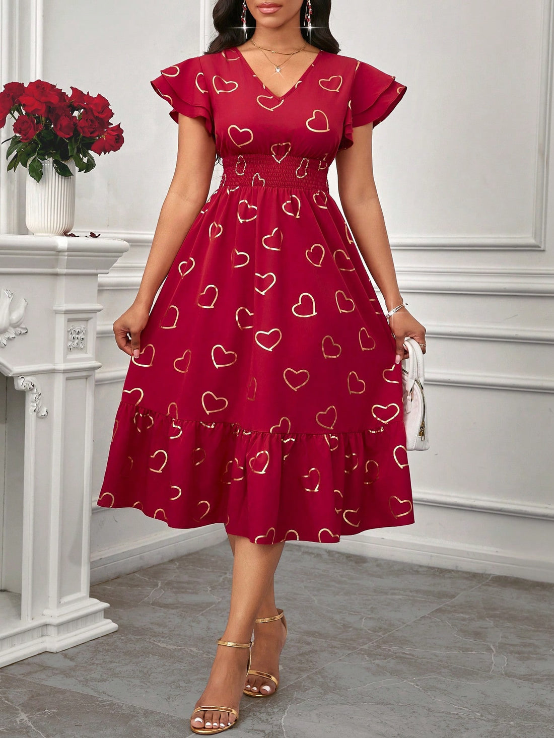 Dress to impress (your special someone) in our Elegant Red Cap Sleeve Dress with Gold Heart Accents. Perfect for Valentine's Day and any stylish occasion, this dress adds a touch of playful glamour to your wardrobe.