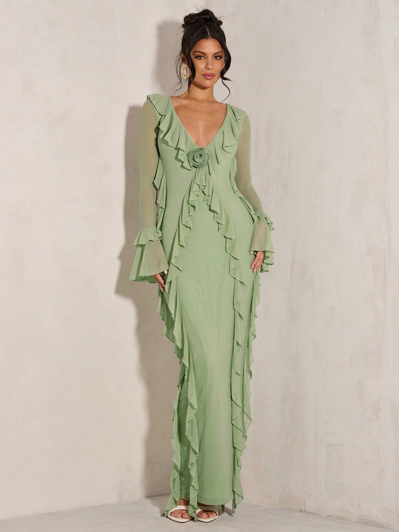 Elevate your style game with this elegant red dress. The deep V-neck and ruffle trim add a touch of romance to any cocktail party or date night. Long sleeves keep you warm while looking chic. Perfect for those who don't take themselves too seriously.