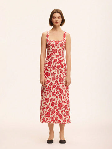 Turn heads with this playful red floral print dress, designed to flatter with its sleeveless cut and fitted waist. Perfect for sunny days or special occasions, it combines comfort and style effortlessly for a stunning look that’s all your own.