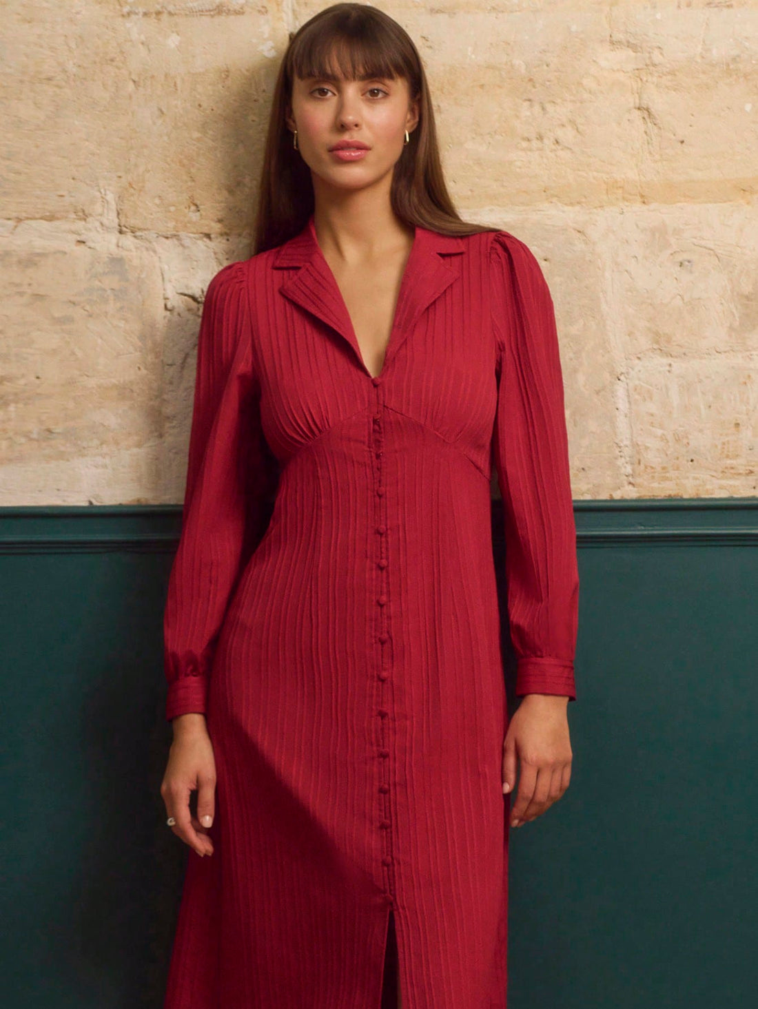 Elevate your autumn wardrobe with this stunning red jacquard stripe midi dress—a timeless piece that effortlessly bridges vintage charm and modern sophistication. The classic button front adds a touch of retro elegance, while the flattering midi length keeps things polished and office-ready. Perfect for layering through cooler months, this dress transitions seamlessly from boardroom meetings to weekend adventures. The rich jacquard texture brings depth and visual interest, making it a versatile staple that 