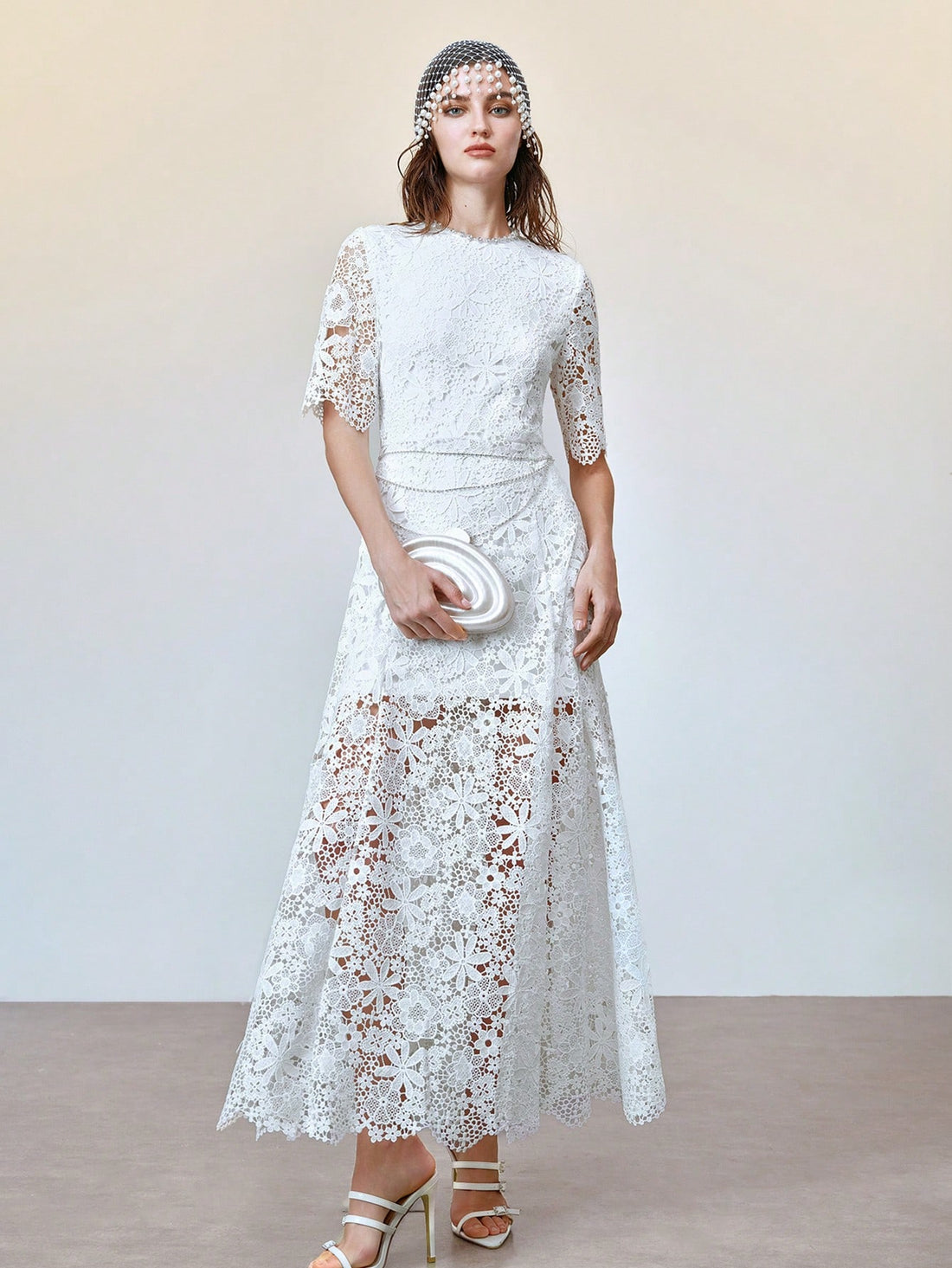 Step into the spotlight with this Elegant Rhinestone-Embellished Lace Maxi Dress, perfect for spring and summer weddings. Delicate lace meets sparkling rhinestones to create a look that’s both graceful and dazzling. Flowing maxi length ensures you’ll twirl with ease, while the shimmering details add just the right amount of sparkle to celebrate love in style. Get ready to turn heads and dance the night away!