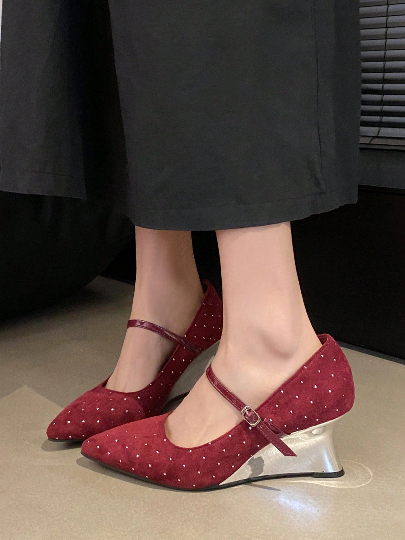 Add some sparkle to your step with our Elegant Rhinestone-Embellished Mary Jane Wedge Heels. Perfect for any stylish woman looking to elevate her outfit and add a touch of glam. These heels are sure to turn heads and make you feel confident and chic.