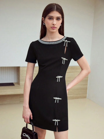 Turn heads on your next date with this playful mini dress featuring a sparkling rhinestone bow accent. Its short sleeves and flattering cut combine comfort with chic style, making it perfect for evenings filled with fun and flirtation. Embrace your confident, stylish side effortlessly!