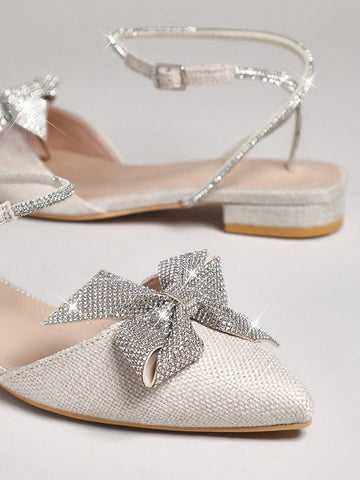 Step out in style with these Elegant Rhinestone Bow Ankle Strap Ballet Flats! Featuring a chic almond toe and sparkling rhinestone bow, they add a touch of glam to any outfit. The ankle strap keeps them snug and comfy, perfect for dancing through your day with a playful bounce.