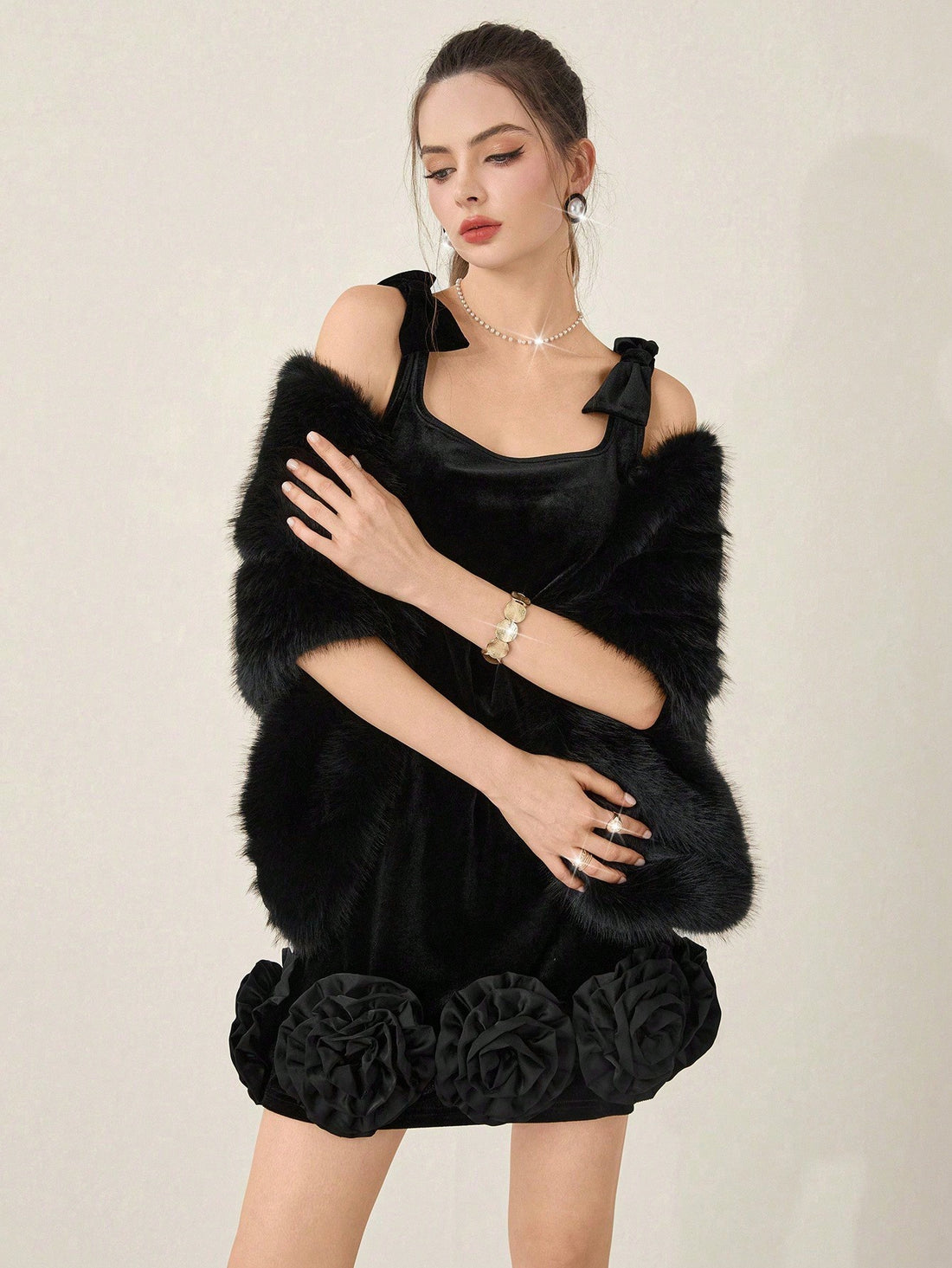 Make a statement at your next event in this show-stopping mini dress! Adorned with sparkling rhinestone details and eye-catching 3D floral embellishments, this dress transforms any occasion into a glamorous affair. The elegant bow accent adds a touch of sophistication while keeping things fun and flirty. Perfect for parties, formal gatherings, or whenever you want to turn heads and feel absolutely fabulous. Slip into luxury and let your style shine as bright as the rhinestones!