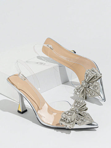 The perfect addition to any party or dance ensemble, these Elegant Rhinestone Bowknot Stiletto Heels exude sophistication and style. The rhinestone detailing and delicate bowknot add a touch of elegance, while the stiletto heel provides height and a sleek silhouette. Ideal for any special occasion, these heels are sure to elevate your look.