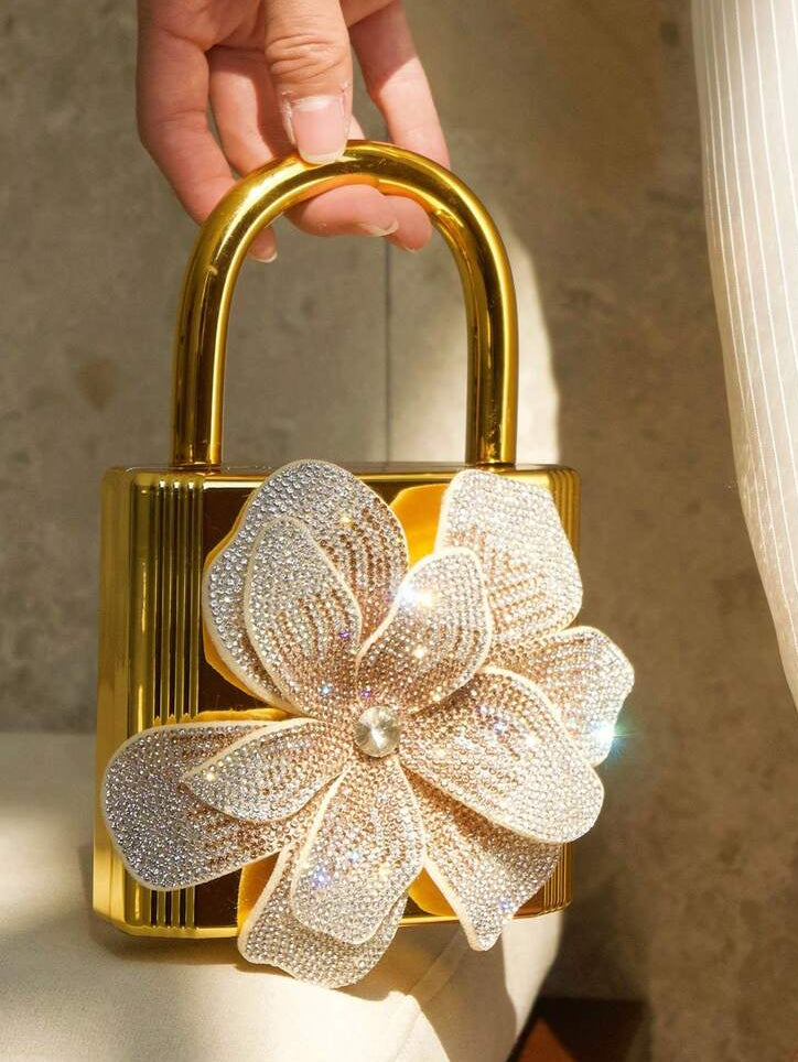 Elevate your evening look with this stunning rhinestone floral crossbody bag. Crafted with luxurious solid-color design and eye-catching mirror texture detailing, it's the perfect companion for parties, galas, and formal occasions. The elegant rhinestone embellishments catch the light beautifully, adding sophistication to any outfit. Wear it crossbody for hands-free convenience or adjust the strap for your preferred style. A timeless accessory that transforms any formal ensemble into something truly memorab