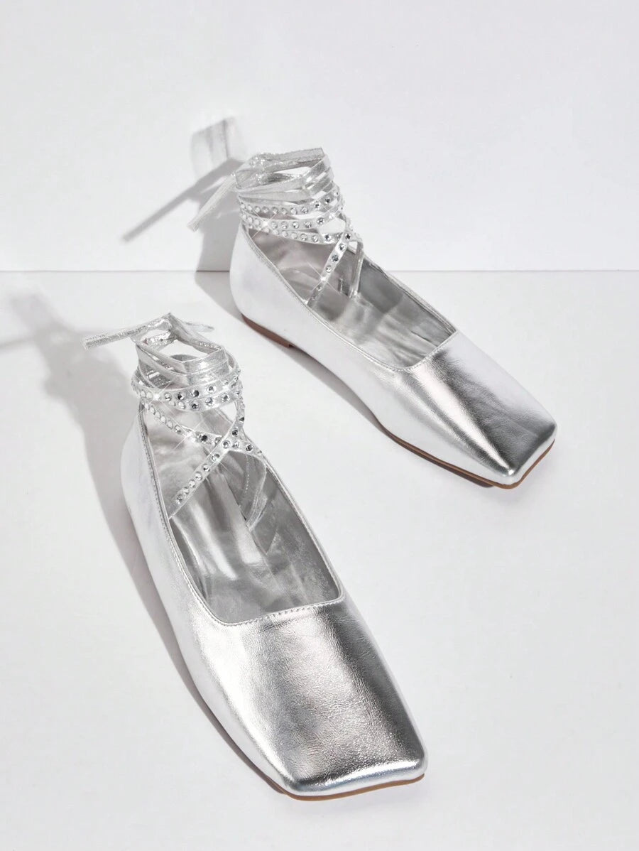 Step into sophistication with these elegant flat shoes, designed for the modern woman who values both style and comfort. Featuring a striking rhinestone trim that catches the light beautifully, these shoes elevate any outfit from casual to refined. The square toe silhouette offers a contemporary edge while providing a comfortable fit for all-day wear. Crafted in a versatile solid color, they pair effortlessly with dresses, jeans, or professional attire. Perfect for work, weekend outings, or special occasion