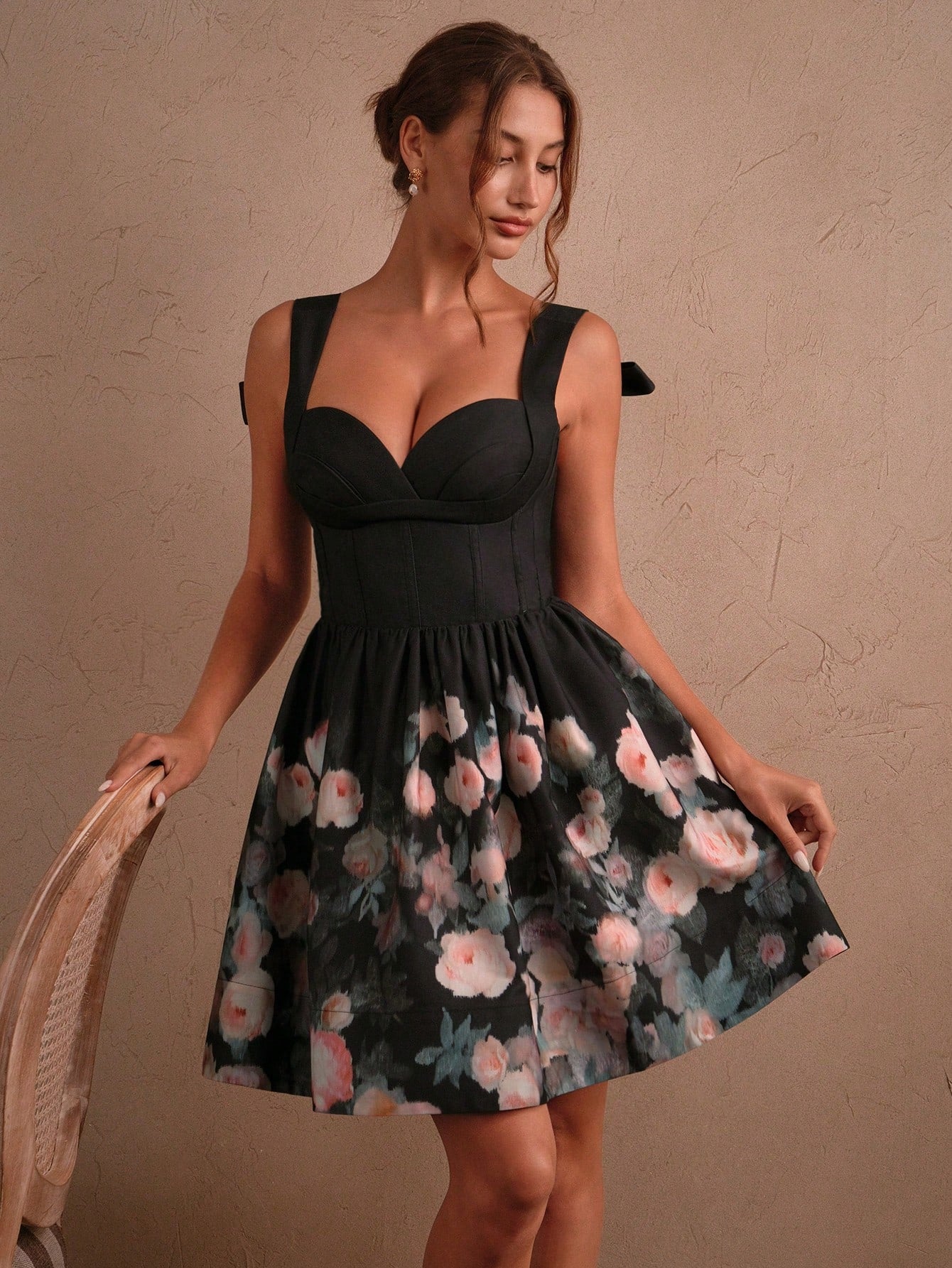 Step into spring and summer with a playful touch in this Elegant Rose Print Mini Dress. Featuring a charming bow tie and a flounce hem, it adds flair to every twirl. The delicate rose pattern brings fresh, feminine vibes, making it perfect for sunny days and garden gatherings. Light and breezy, this dress keeps you comfortable while turning heads with its sweet, stylish details.