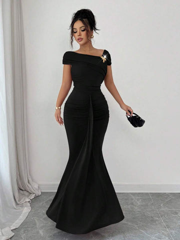 This sophisticated long dress features expertly ruched detailing that creates a flattering, sculpted silhouette while maintaining elegant movement. The fitted design accentuates your natural curves, while the metallic buckle accent adds a refined touch of contemporary glamour. Crafted for occasions demanding polish and poise, this piece transitions seamlessly from evening events to upscale gatherings. The ruching technique not only enhances the dress's visual interest but also provides subtle shaping for a 