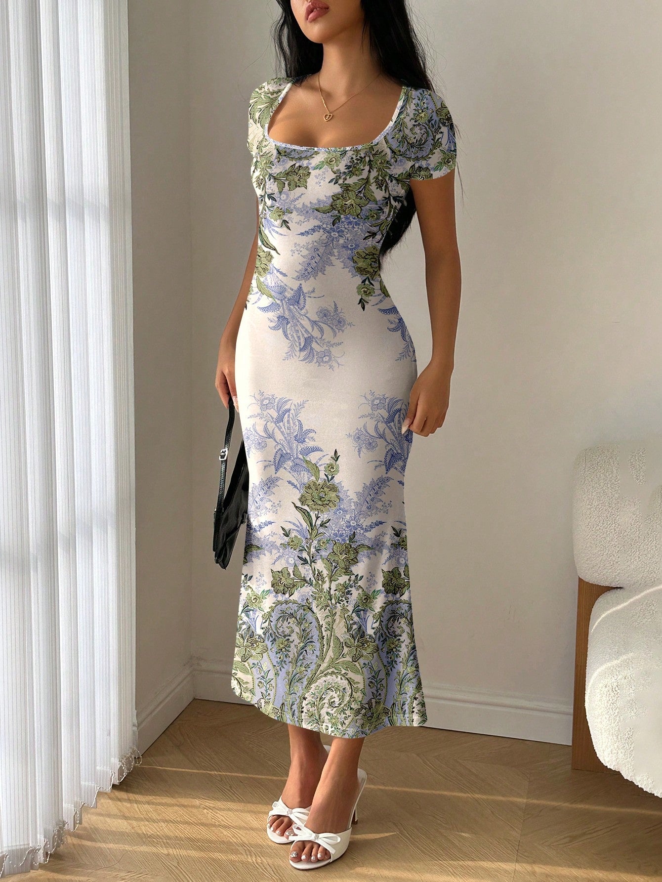 Get ready to turn heads in our Elegant Ruffle Mermaid Bodycon Dress. With a bespoke summer placement print and playful ruffle detailing, this dress is perfect for any summer occasion. Show off your unique style in this head-turning piece!