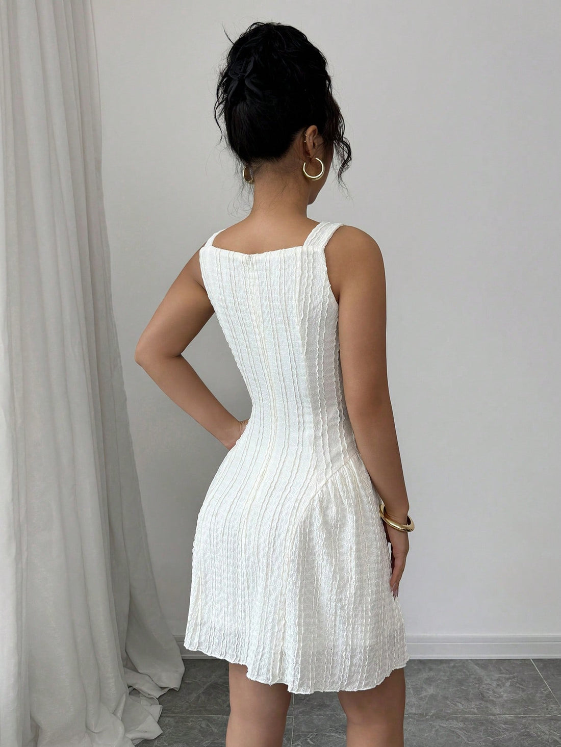 Be the belle of the ball in our Elegant Ruffle Midi Dress! Designed with adjustable straps, this dress is perfect for any occasion. Whether it's a wedding or a night out, you'll be sure to turn heads with its stylish ruffles. Say yes to this dress!