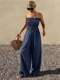 Elevate your spring and summer wardrobe with this sophisticated two-piece set. The strapless bandeau top features elegant ruffle detailing and an asymmetrical cut, while the straight-leg pants offer a polished silhouette. Crafted from 100% polyester with slight stretch for comfort, this versatile ensemble transitions seamlessly from office meetings to beach getaways. The navy blue colorway pairs effortlessly with accessories. Machine washable for easy care.