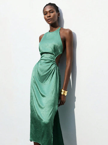 Turn heads in this stunning sage green ruched dress that's equal parts sophisticated and fun. The halter neckline and daring backless design create an effortlessly chic silhouette perfect for making a statement at parties, weddings, or tropical getaways. Ruching details add flattering dimension while keeping things playful and modern. Whether you're dancing the night away or sipping cocktails on deck, this versatile piece transitions seamlessly from celebration to celebration. Dress it up with heels and jew