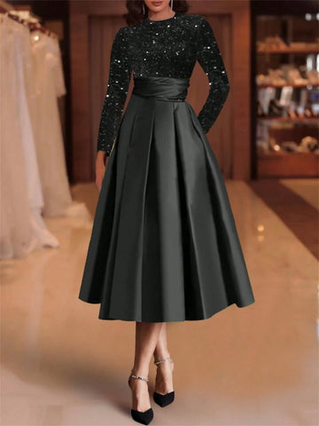 Step into the spotlight with this Elegant Satin Midi Dress, designed to turn heads at any holiday party. Featuring a chic velvet sequin contrast and flattering A-line silhouette, this dress combines comfort with sparkly sophistication. The long sleeves add a graceful touch, making it perfect for festive evenings filled with fun and flair. Embrace the season’s magic and dance the night away in style!