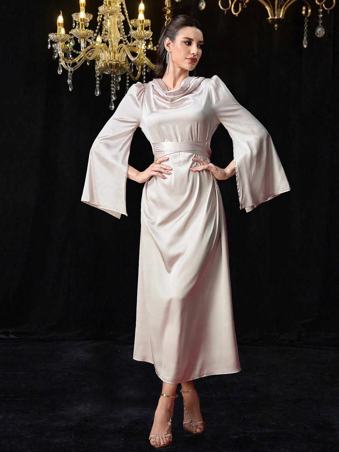 Add a touch of elegance to your wardrobe with our Satin V-Neck Belted Maxi Dress. The soft satin fabric drapes beautifully, while the belted waist cinches in for a flattering silhouette. Its long sleeves make it the perfect choice for any occasion. (Style and comfort in one? Non-tacky satin? Yes, please!)