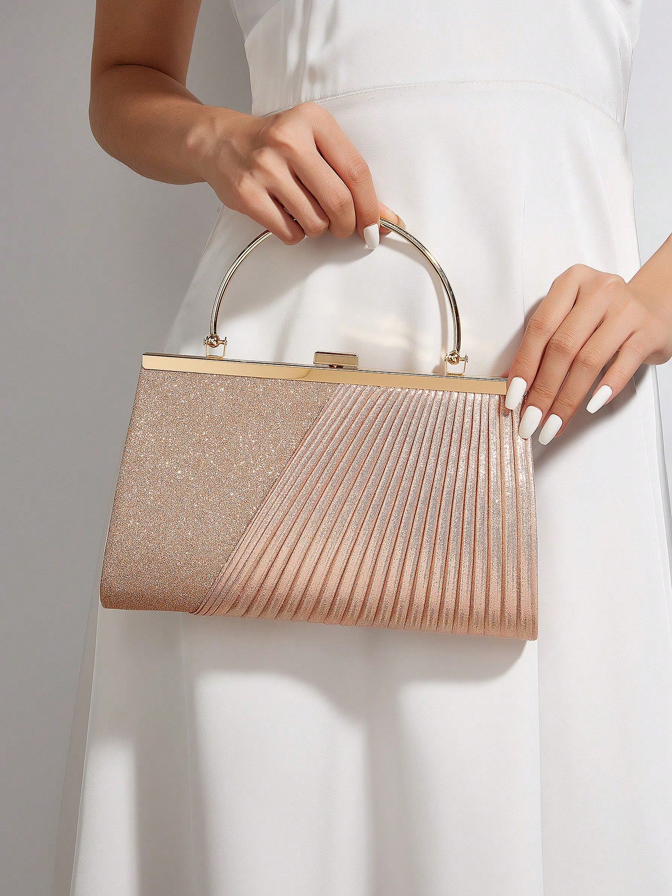 Add a touch of luxury to your special occasion with our Elegant Sequin Pleated Clutch Bag. Designed to elevate any outfit, this bag is perfect for weddings, proms, and evening events. The stunning sequin pleated design adds a glamorous touch, making you the center of attention. Expertly crafted for a chic and sophisticated look.