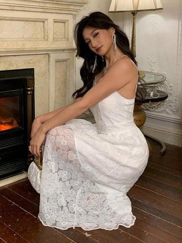 Step into the spotlight with this Elegant Sheer Lace Jacquard Midi Dress. Featuring delicate spaghetti straps and a playful sheer lace overlay, it’s perfect for turning heads at parties and special occasions. The midi length adds a touch of sophistication while keeping the vibe fun and flirty. Get ready to dance the night away in style!