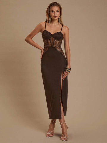 Slip into sophistication with this stunning maxi dress that's equal parts glamorous and flirty. Sheer lace panels add an alluring touch while the dramatic high slit keeps things exciting—whether you're dancing the night away at prom or turning heads at your next special event. The flowing silhouette flatters every figure, and the elegant design ensures you'll feel like the star of the show. This is the dress that makes an entrance unforgettable.