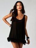 Turn heads with this Elegant Sheer Mini Babydoll Dress featuring delicate feather trim that adds a flirty touch. Its lightweight, sheer fabric lets you feel effortlessly glamorous, making it ideal for parties or a fun night in. Playful and charming, this dress promises to elevate your evening with a dash of whimsy and style.