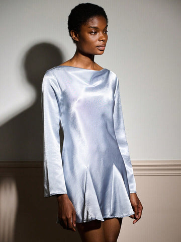 Slip into sophistication with this stunning silver blue satin mini dress—your new party essential! The luxe satin fabric drapes beautifully while the flare sleeves add a playful, romantic touch. A pleated hem creates movement and dimension, perfect for twirling through autumn and winter celebrations. Whether you're heading to a holiday gathering or a night out with friends, this dress strikes the ideal balance between elegant and fun. Pair it with heels and your favorite accessories for an unforgettable loo