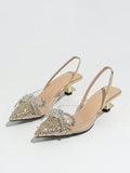 Step into sparkle with these Elegant Silver Pointed Toe Slingback Pumps! Featuring a dazzling rhinestone bow, they add just the right touch of glam to your wedding or formal event outfit. The sleek pointed toe and slingback design keep things chic and comfortable, so you can dance the night away with confidence and style. Perfect for making every step shine!