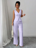 Elevate your professional wardrobe with this sophisticated sleeveless blazer vest and suit pants set. Designed for the modern businesswoman, this two-piece ensemble features a flattering V-neck button-front vest in luxurious mauve purple with a slim-fit silhouette that transitions seamlessly from office to evening occasions. The set pairs perfectly for summer business wear, offering a polished, put-together look without the bulk of traditional blazers. 