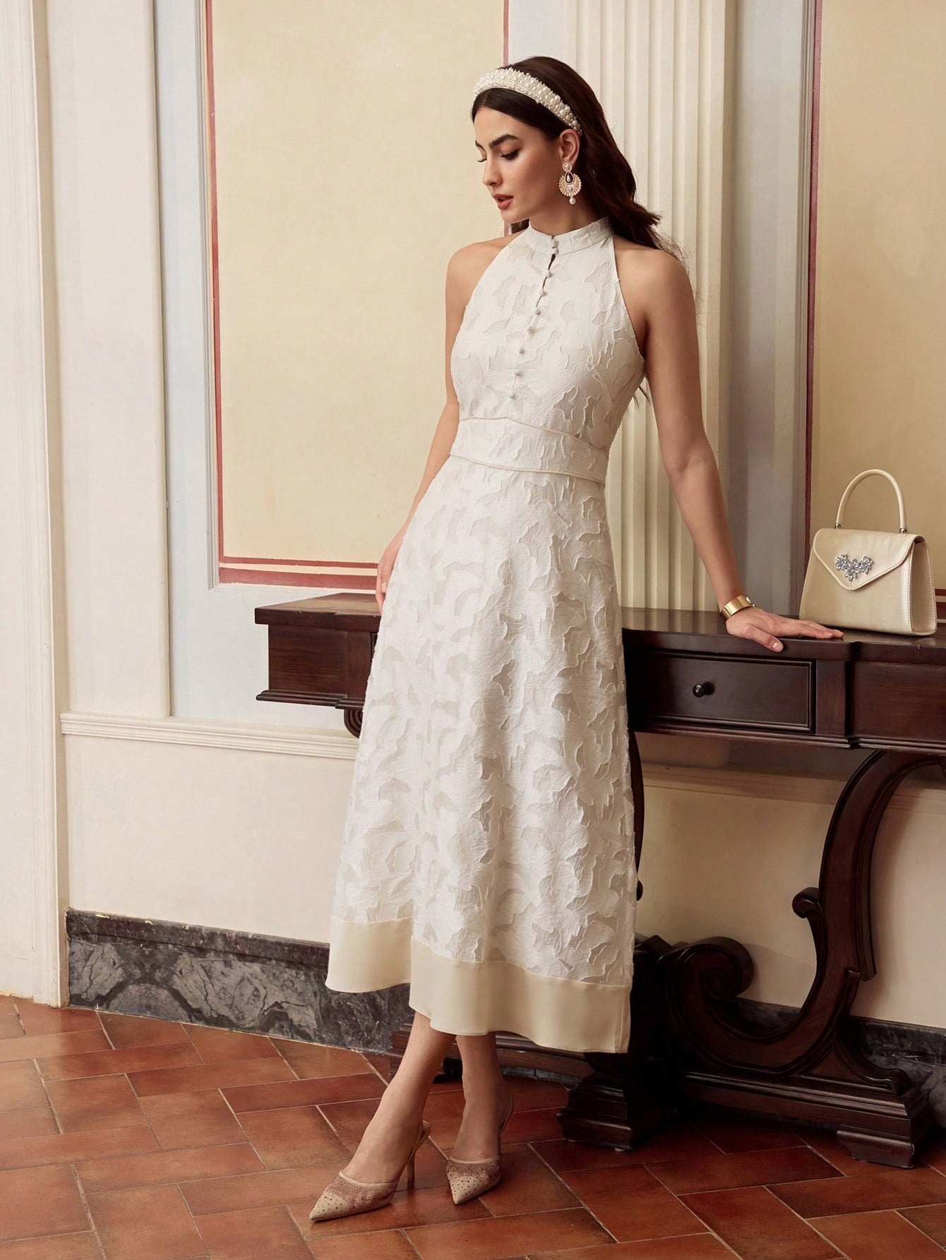 Turn heads in this playful yet elegant sleeveless jacquard midi dress. Its textured fabric adds a chic twist, while the stylish waist cinching beautifully highlights your curves for a flattering fit. Perfect for celebrations or a night out, this dress blends comfort and charm effortlessly.