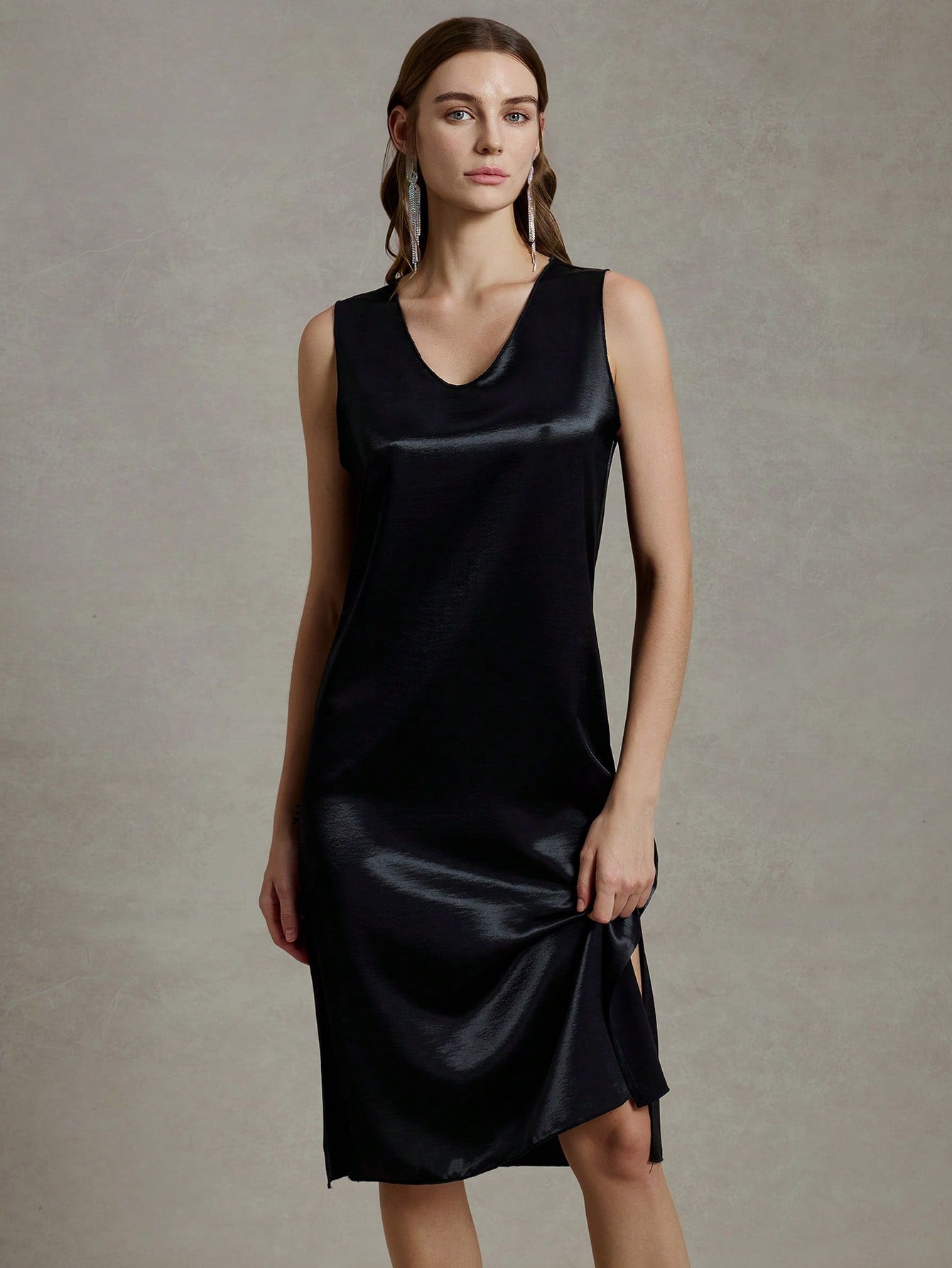 Step into summer with this elegant sleeveless lace long dress, designed to keep you cool and stylish by the beach. Its delicate lace details add a touch of romance, while the flowing silhouette ensures comfort and grace. Perfect for sunny days and seaside strolls, this dress effortlessly blends sophistication with a playful summer vibe.