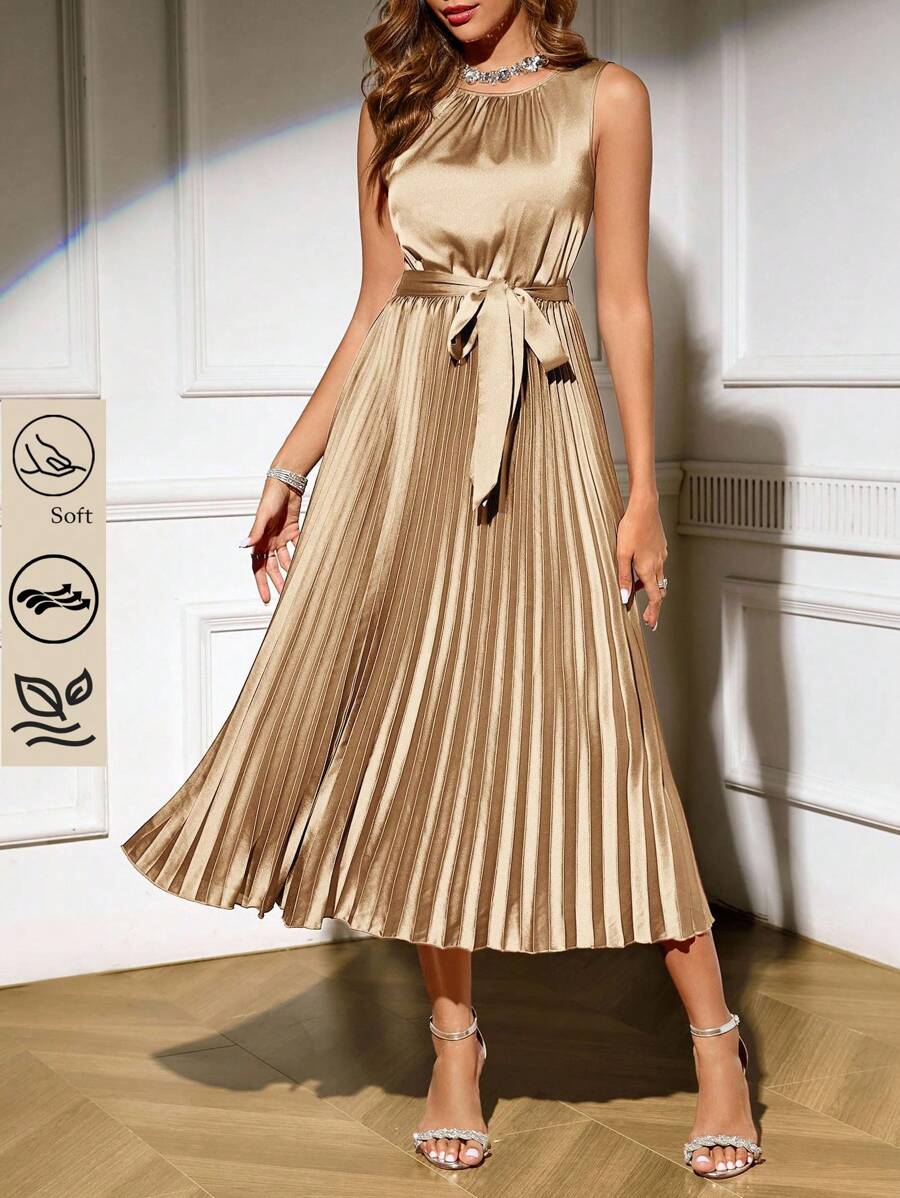 Step into summer with this playful and elegant sleeveless midi dress. Featuring a solid color and a charming pleated waist, it effortlessly flatters your silhouette while keeping you cool. Perfect for sunny days or evening strolls, this dress blends comfort with a touch of sophistication to brighten your wardrobe.