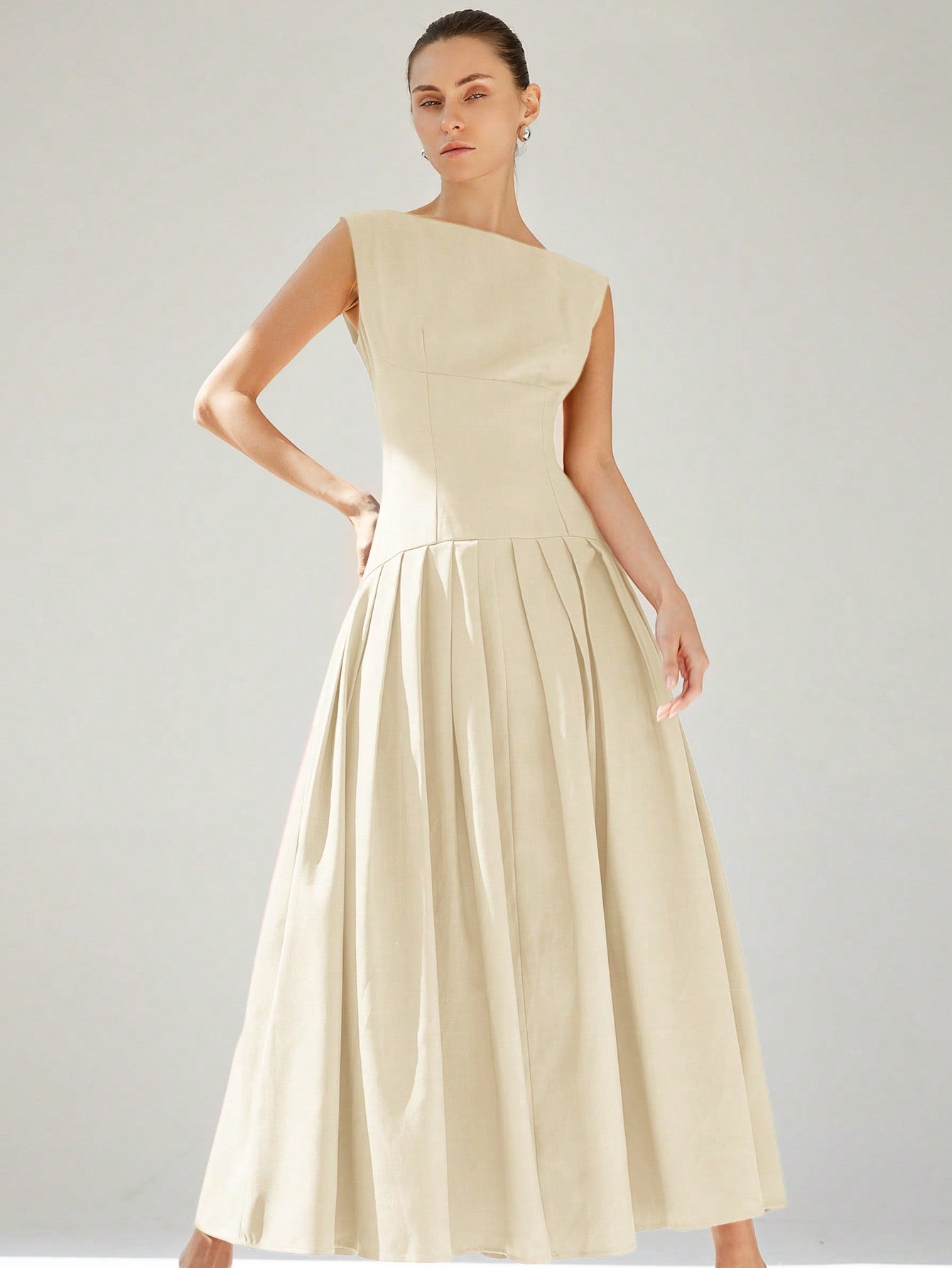 Turn heads this Valentine's Day in our elegant sleeveless red dress, featuring a flirty ruffle trim and a charming ruched hem. Its playful design hugs your silhouette while adding a touch of fun and romance to your look. Perfect for dancing the night away or a cozy dinner date, this dress brings out your confident, vibrant side with every step.