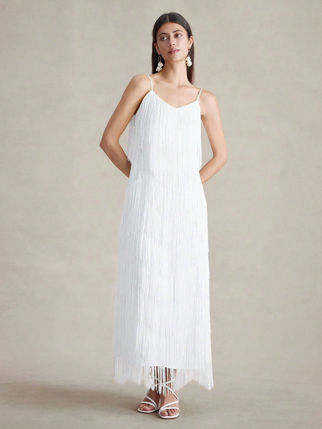 Step into the spotlight with this playful sleeveless dress featuring layered fringe that dances with every move. Its solid color keeps things chic and versatile, making it your go-to for summer parties, cozy fall dates, or sunny vacations. Lightweight and fun, it’s designed to keep you comfortable while turning heads wherever you go.