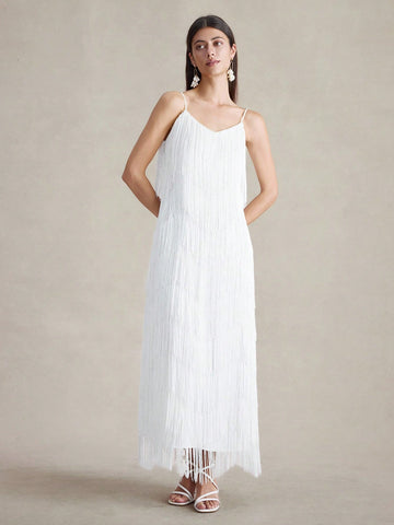 Step into the spotlight with this playful sleeveless dress featuring layered fringe that dances with every move. Its solid color keeps things chic and versatile, making it your go-to for summer parties, cozy fall dates, or sunny vacations. Lightweight and fun, it’s designed to keep you comfortable while turning heads wherever you go.