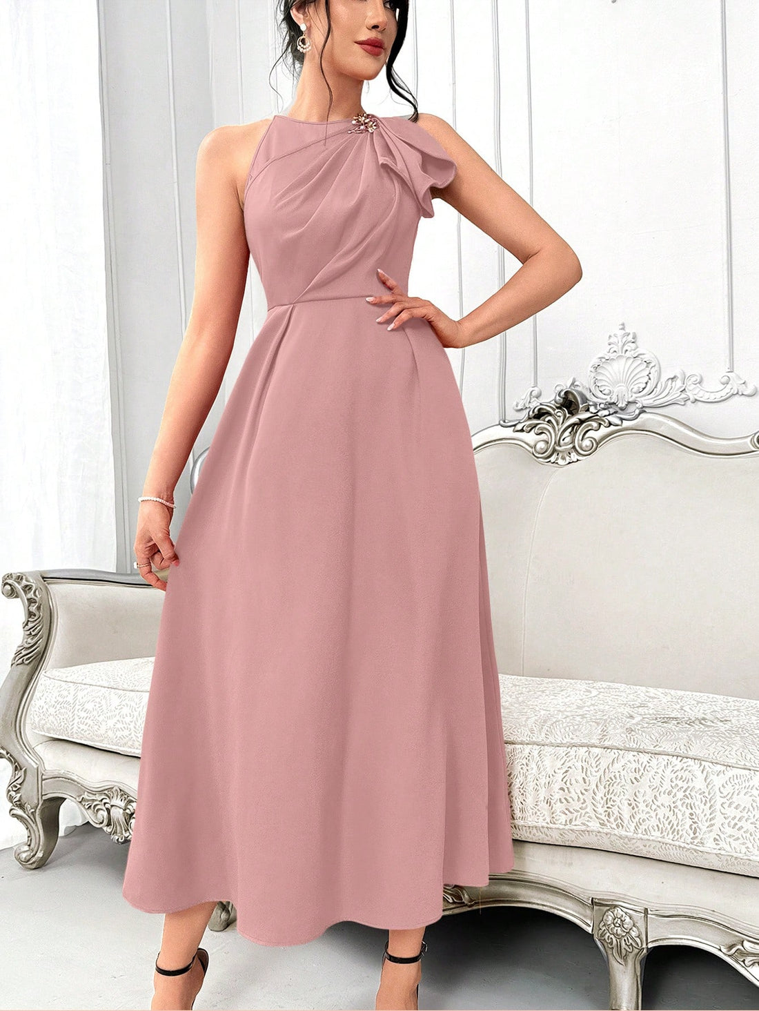 This sleeveless summer maxi dress boasts an elegant design featuring a ruffle hem and pleated detailing. With its chic and stylish appearance, this dress is perfect for any summer event, providing both comfort and sophistication. Let this dress make a statement for you with its beautiful and timeless design.