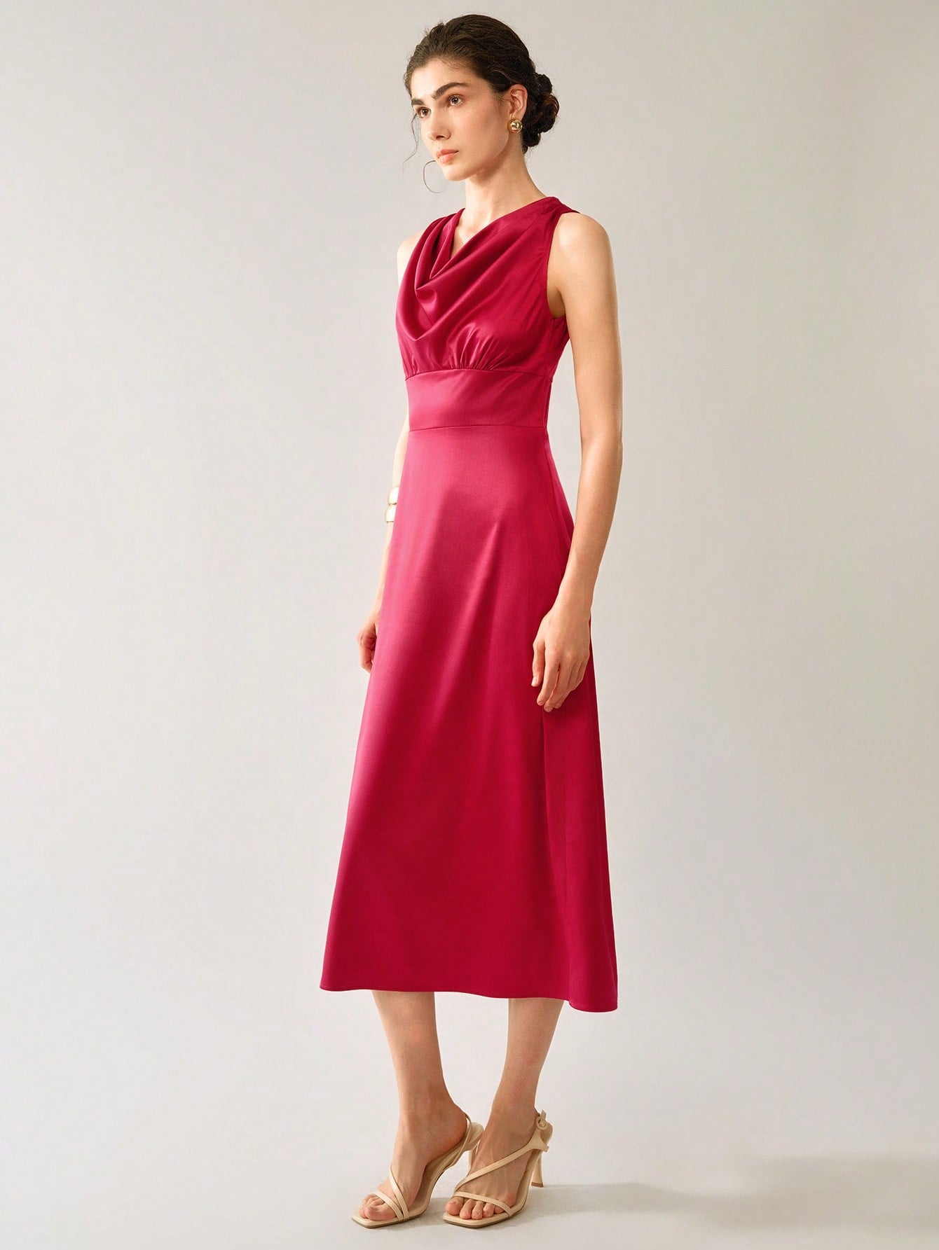 Get ready to turn heads at any wedding this season with our elegant sleeveless V-neck midi dress. With its flattering fit and timeless style, this dress is the perfect choice for any special occasion. Say "I do" to effortless style and comfort in our must-have dress.
