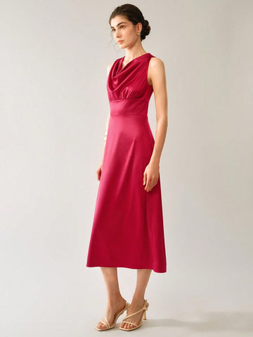 Get ready to turn heads at any wedding this season with our elegant sleeveless V-neck midi dress. With its flattering fit and timeless style, this dress is the perfect choice for any special occasion. Say "I do" to effortless style and comfort in our must-have dress.