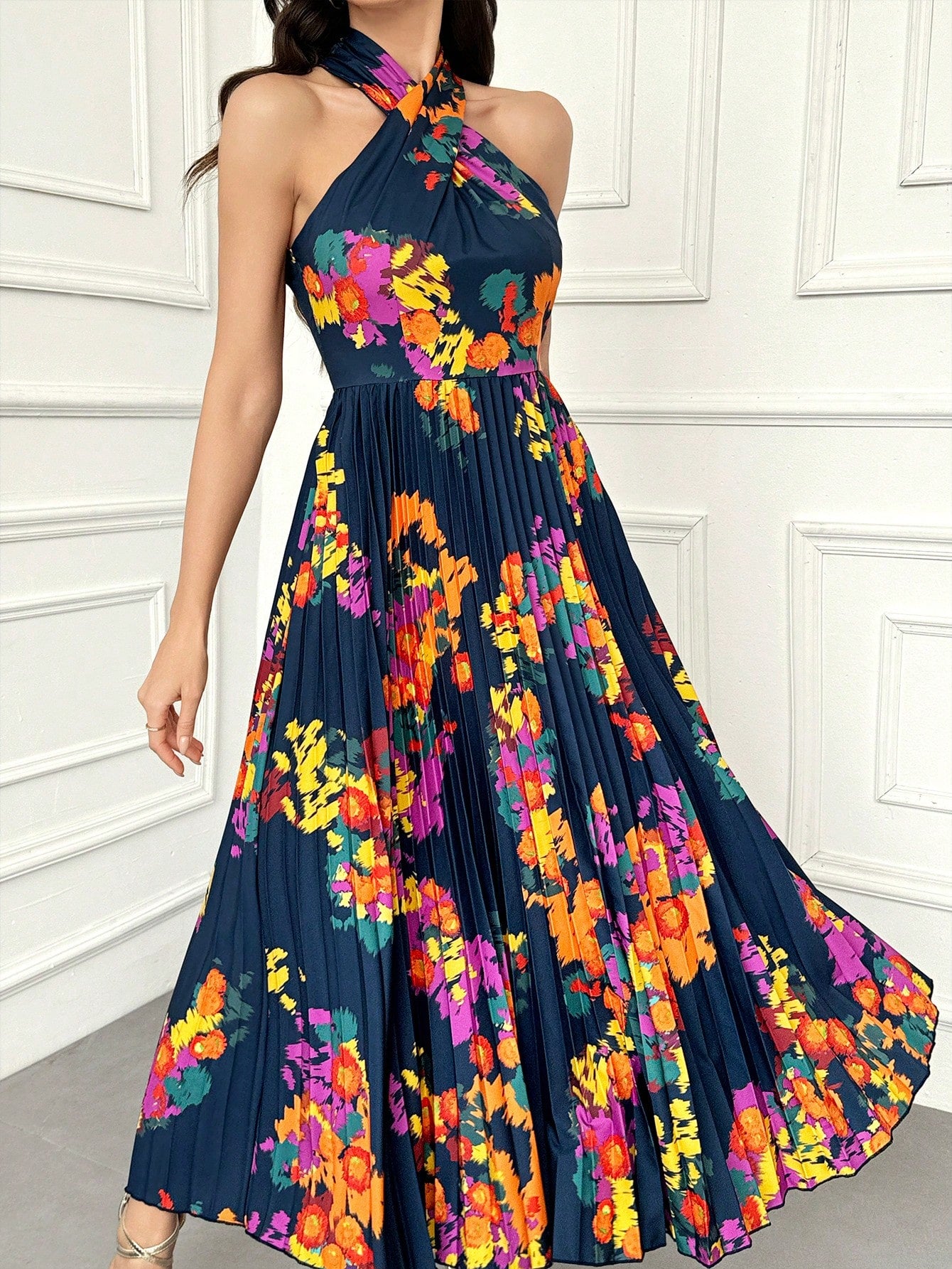 Dance the night away in style with our Elegant Sleeveless Women's Evening Dress. Featuring a stunning all-over print and a playful neck pendant, this dress is sure to turn heads. Perfect for any special occasion, you'll feel confident and stylish in this statement piece.